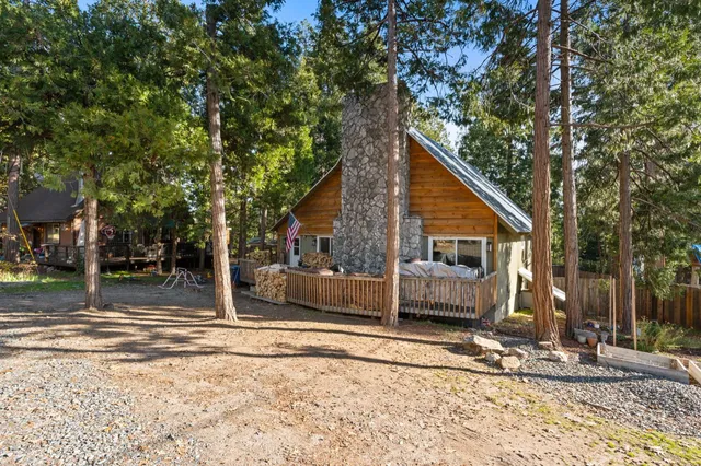 a house with trees in the background
