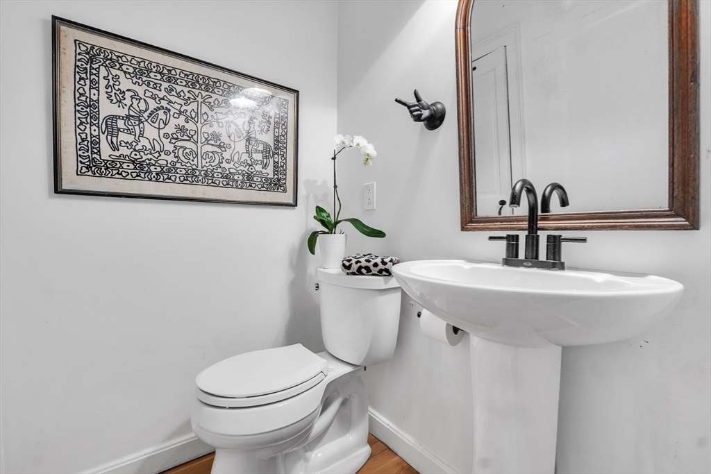 4 Black Hill Road Paxton, MA 01612 - Photo 12 of 42 a bathroom with a sink mirror and toilet