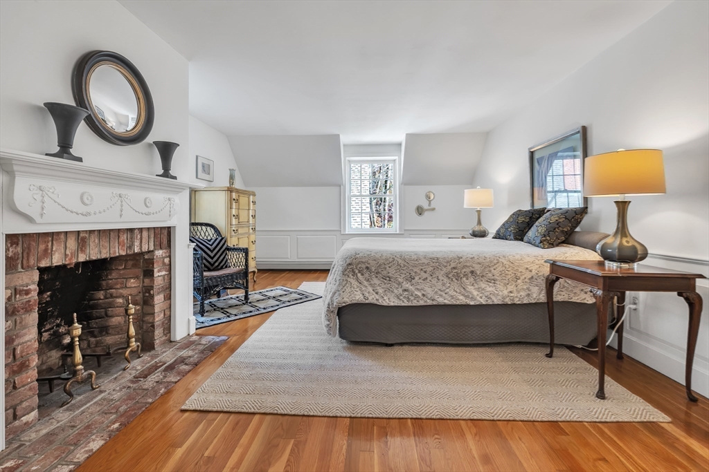 4 Black Hill Road Paxton, MA 01612 - Photo 20 of 42 a bedroom with a bed and a fireplace