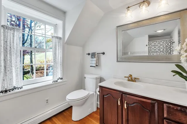 a bath room with a bath tub and a shower