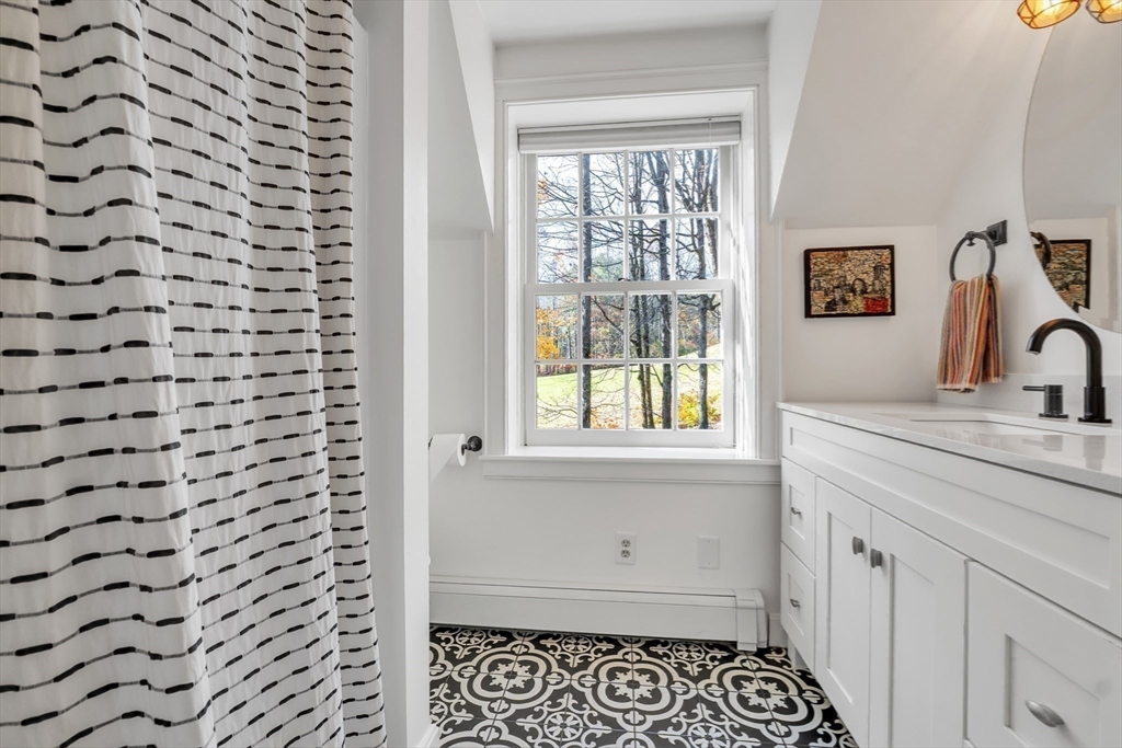 4 Black Hill Road Paxton, MA 01612 - Photo 26 of 42 a bathroom with a sink a vanity and a shower
