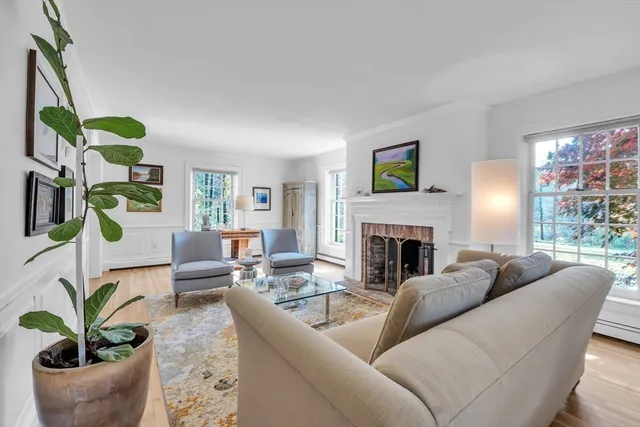 a workspace with furniture window and wooden floor