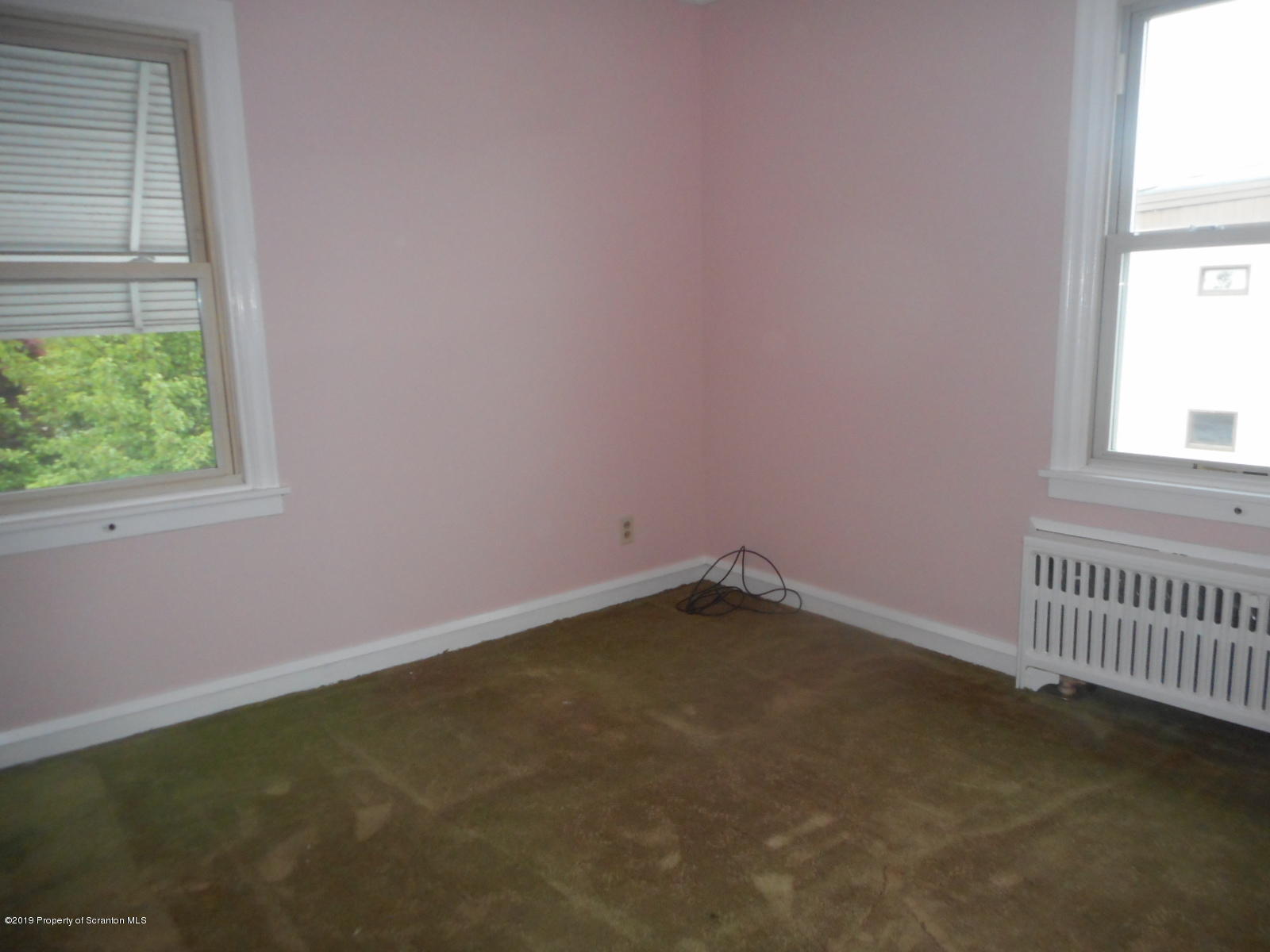232 Oak Street Old Forge, PA 18518 - Photo 13 of 19 an empty room with a window
