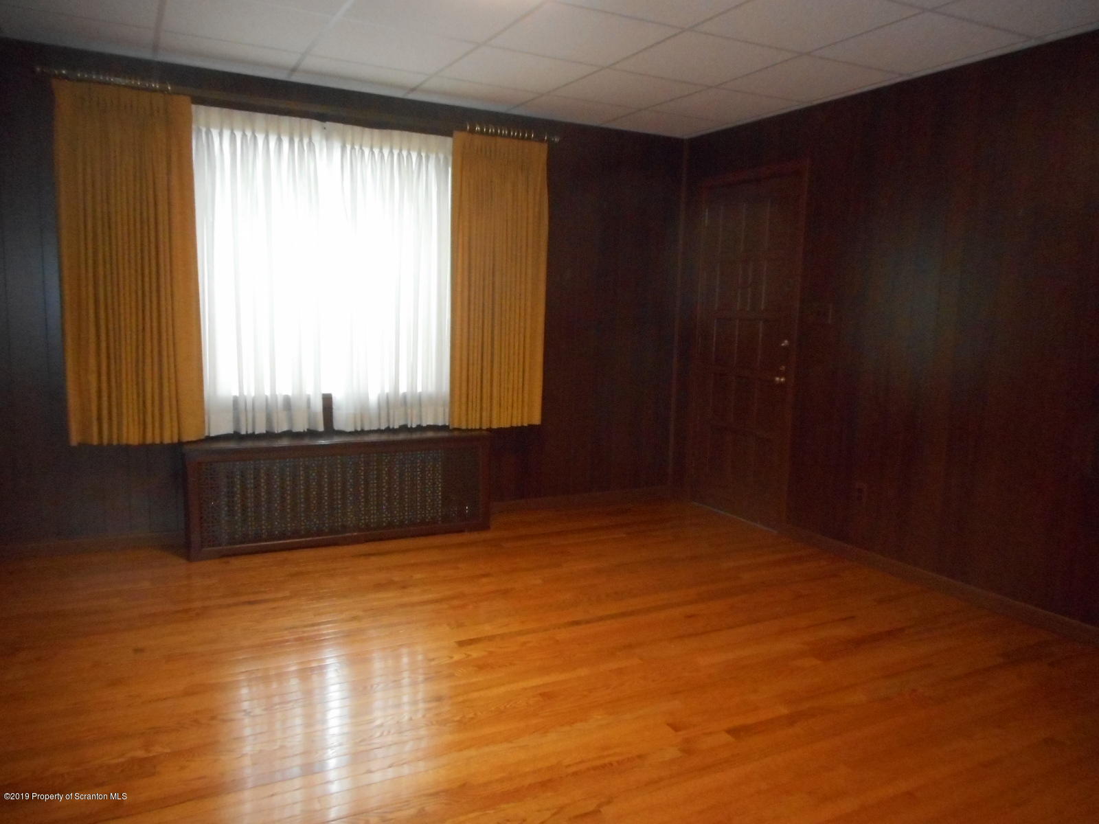 232 Oak Street Old Forge, PA 18518 - Photo 9 of 19 a view of an empty room and window