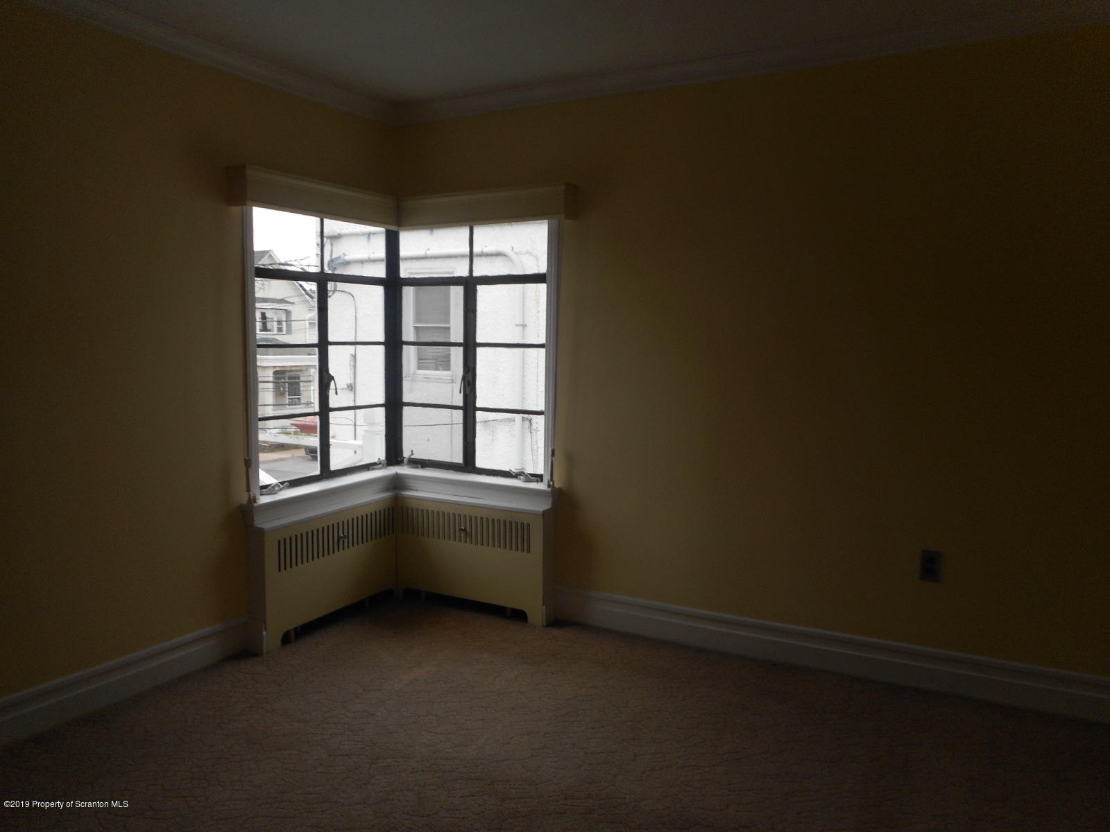 232 Oak Street Old Forge, PA 18518 - Photo 10 of 19 an empty room with windows
