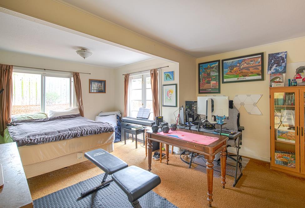 3041 Bird Rock Road Pebble Beach, CA 93953 - Photo 12 of 18 a living room with furniture and a large window
