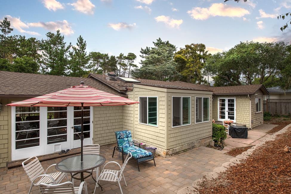 3041 Bird Rock Road Pebble Beach, CA 93953 - Photo 14 of 18 a front view of a house with patio