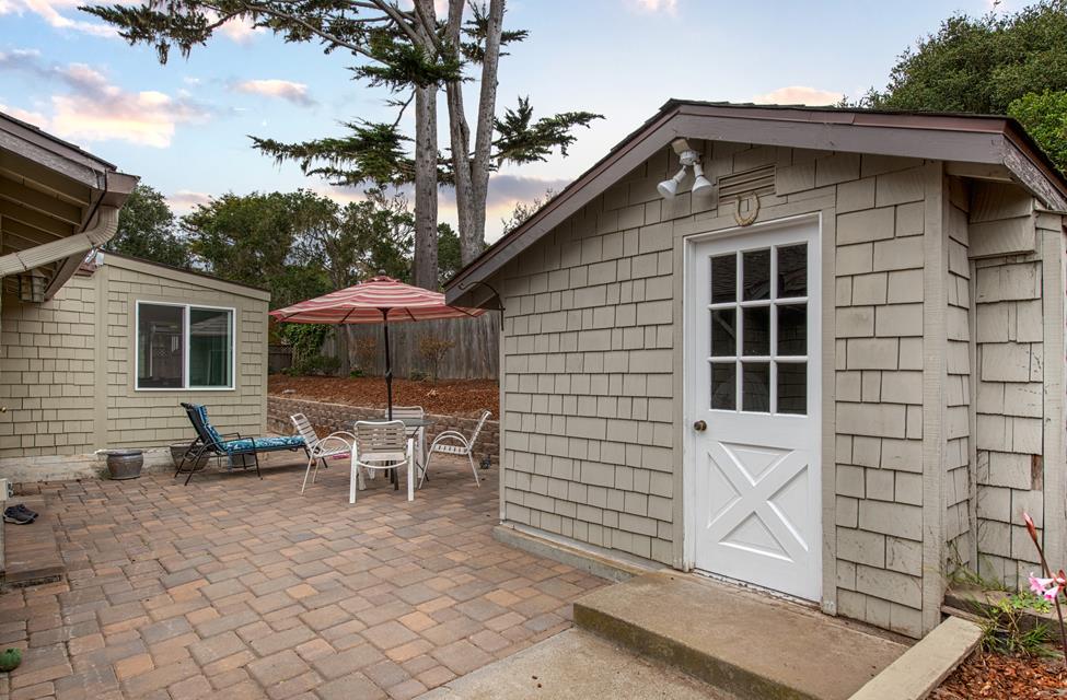 3041 Bird Rock Road Pebble Beach, CA 93953 - Photo 15 of 18 a front view of a house with sitting area