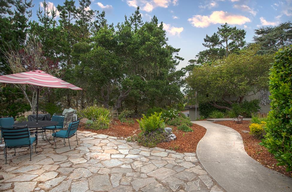 3041 Bird Rock Road Pebble Beach, CA 93953 - Photo 16 of 18 a view of backyard with plants and outdoor seating