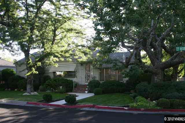 200 Bisby Street Reno, NV 89512 - Photo 3 of 13 a front view of a house with garden