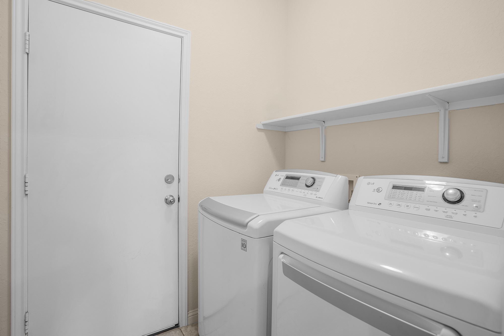 16012 McAloon Way Austin, TX 78728 - Photo 12 of 34 a utility room with dryer and washer