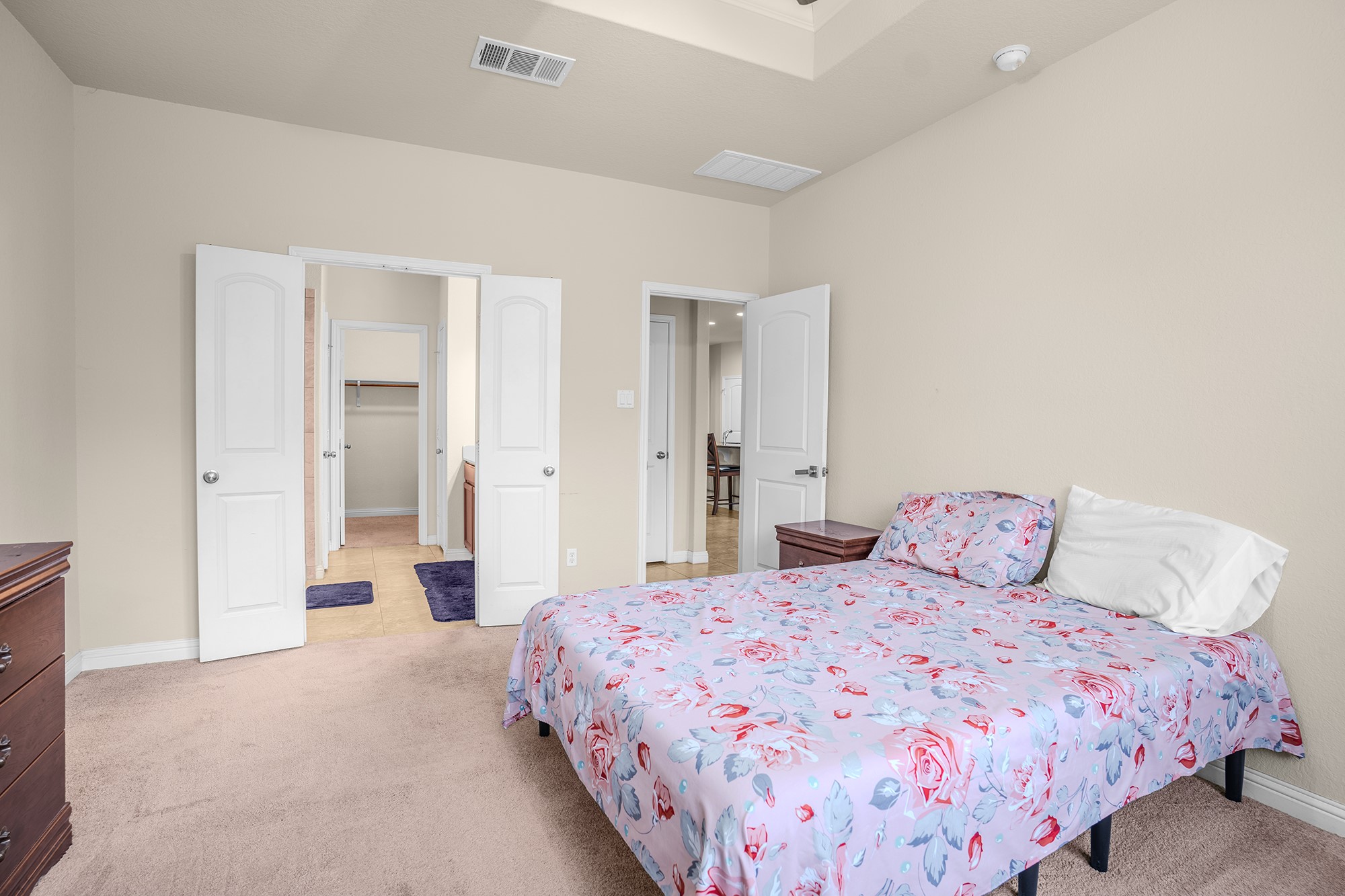 16012 McAloon Way Austin, TX 78728 - Photo 18 of 34 a bedroom with a bed and closet