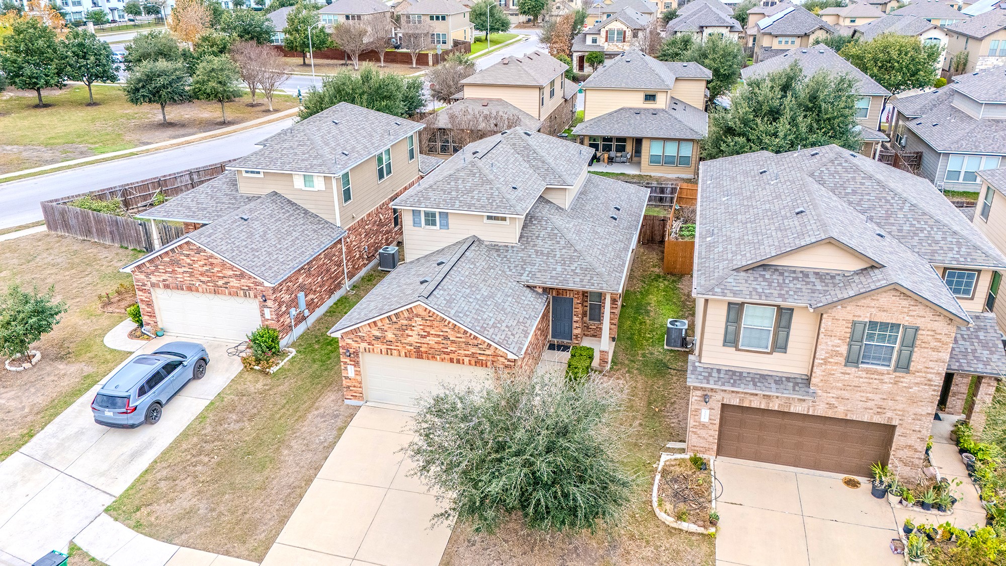 16012 McAloon Way Austin, TX 78728 - Photo 2 of 34 an aerial view of residential houses with outdoor space and swimming pool