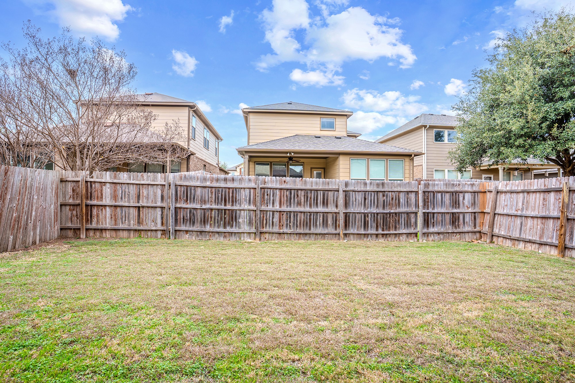 16012 McAloon Way Austin, TX 78728 - Photo 32 of 34 a view of a house with a swimming pool and a yard