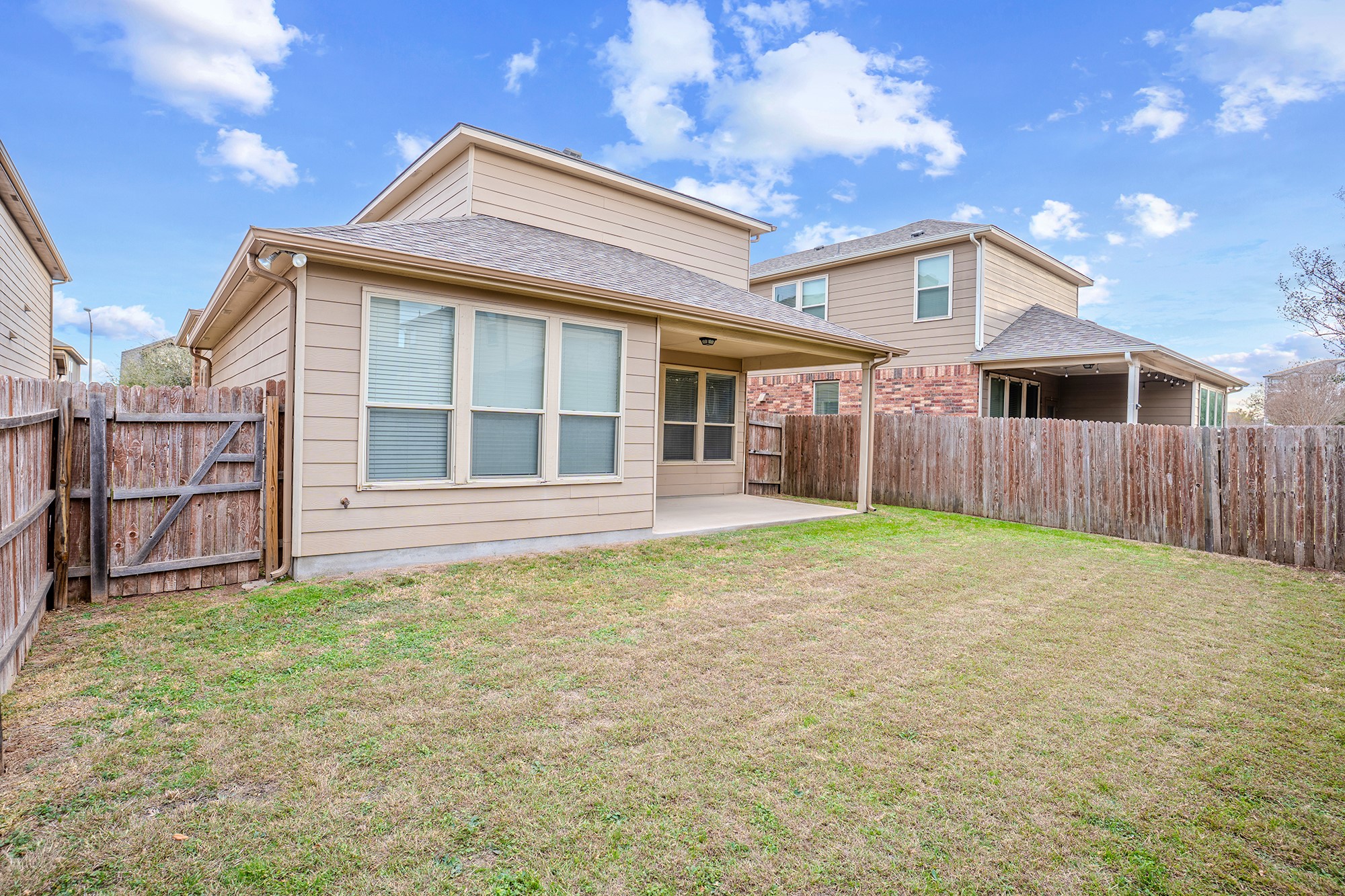 16012 McAloon Way Austin, TX 78728 - Photo 34 of 34 a front view of a house with a yard