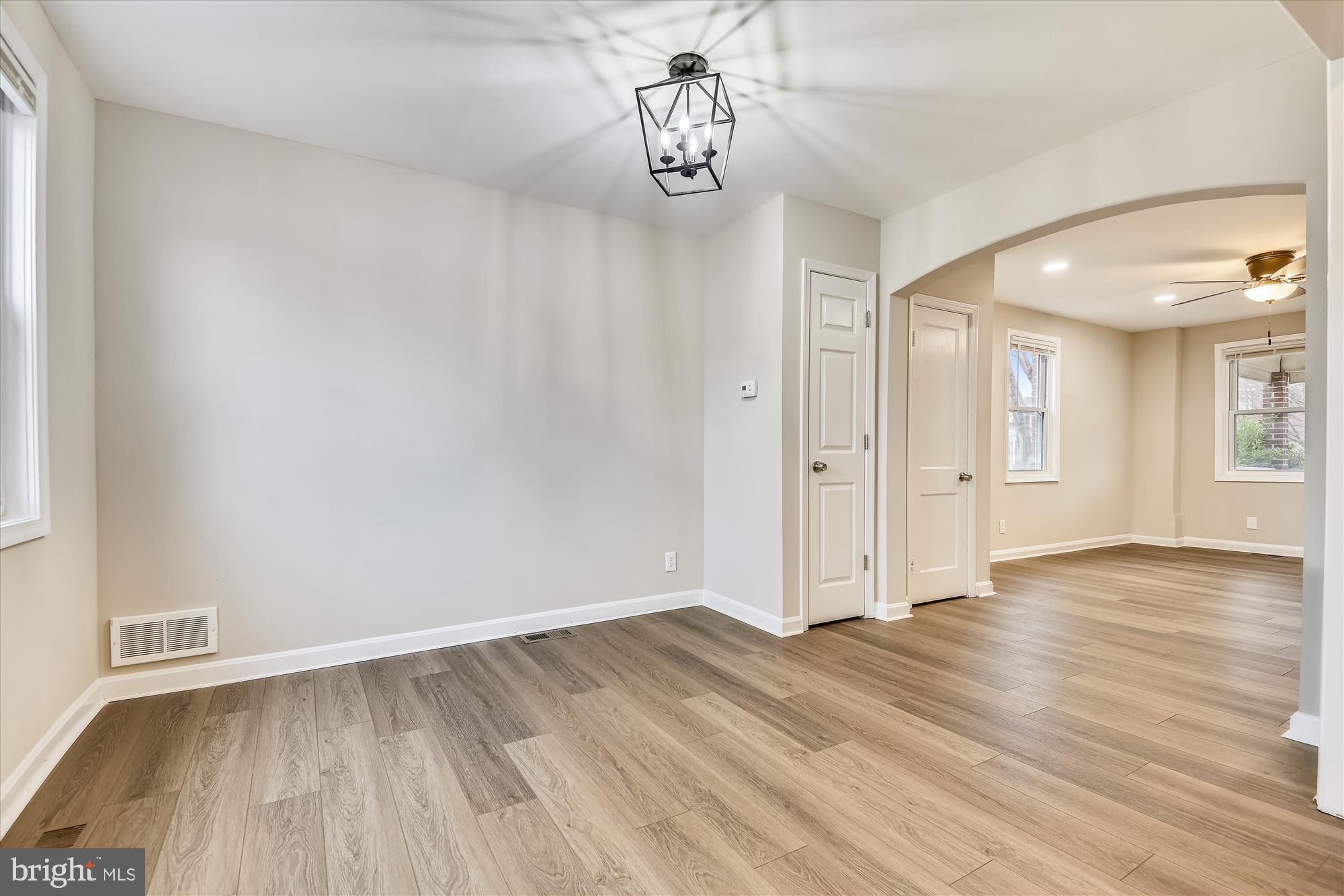 3513 Dunhaven Road Baltimore, MD 21222 - Photo 9 of 29 Looking across the dining room - new luxury plank
