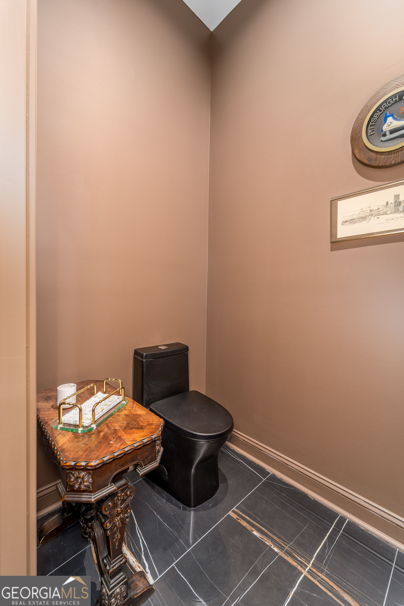 197 Northwest Broad Street Jesup, GA 31545 - Photo 42 of 54 a room with a table and chairs