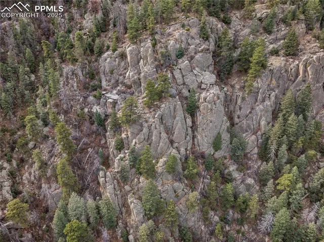 an aerial view of multiple house with yard