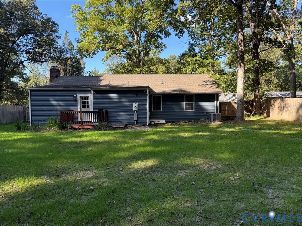 3831 Wood Dale Road Chester, VA 23831 - Photo 16 of 19 Rear view of house featuring and a deck and patio.