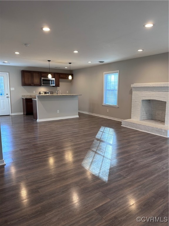 3831 Wood Dale Road Chester, VA 23831 - Photo 18 of 19 Living room with an open floor plan to dining and