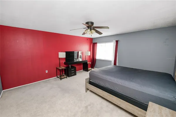 a room with furniture and chandelier