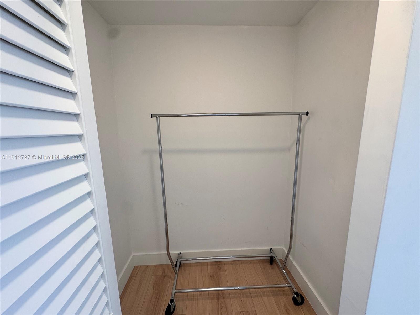 2899 Collins Avenue, Unit 1212 Miami Beach, FL 33140 - Photo 16 of 37 a bathroom with a tub