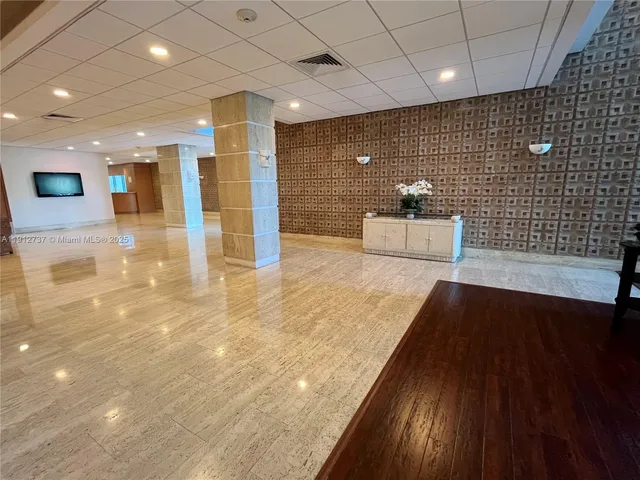 a view of a livingroom with furniture