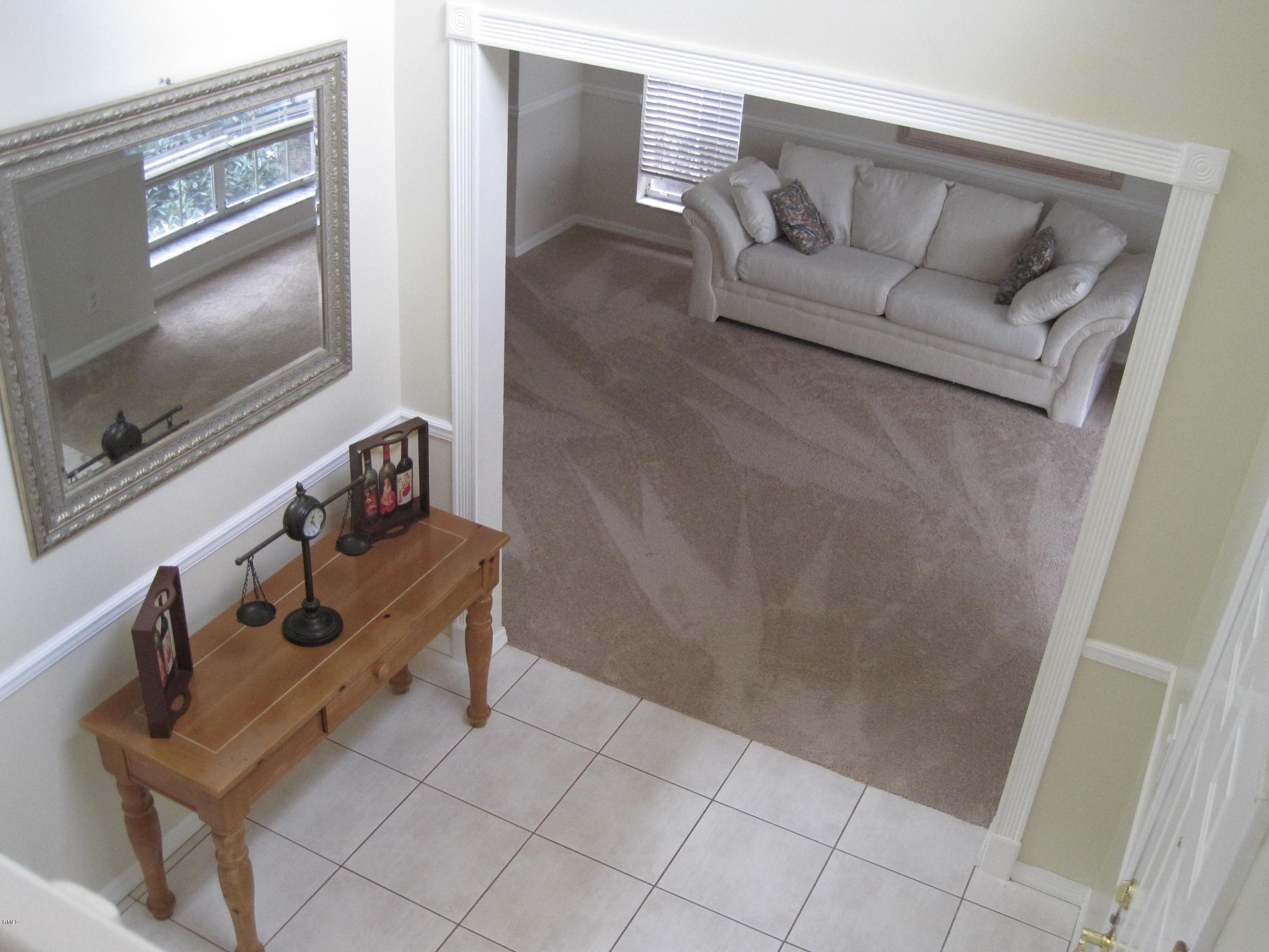 3930 Sabal Lakes Road Delray Beach, FL 33445 - Photo 20 of 30 a living room with furniture and a flat screen tv