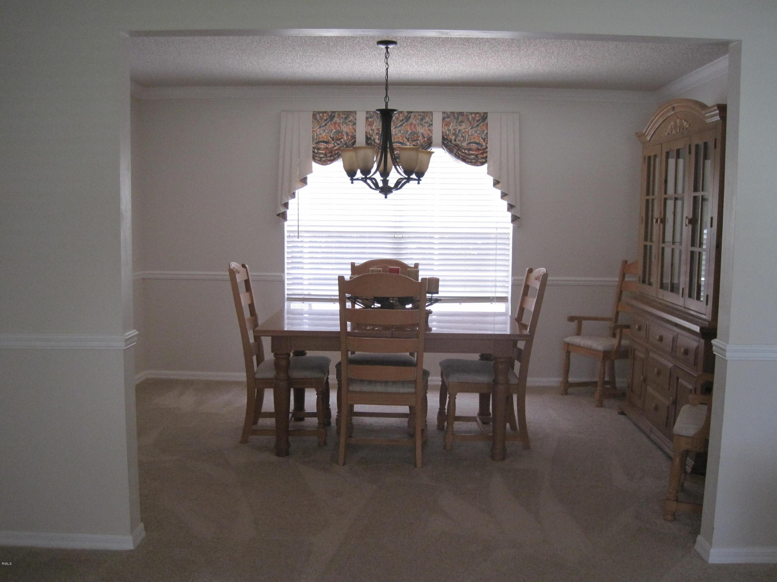3930 Sabal Lakes Road Delray Beach, FL 33445 - Photo 7 of 30 a dining room with furniture and window