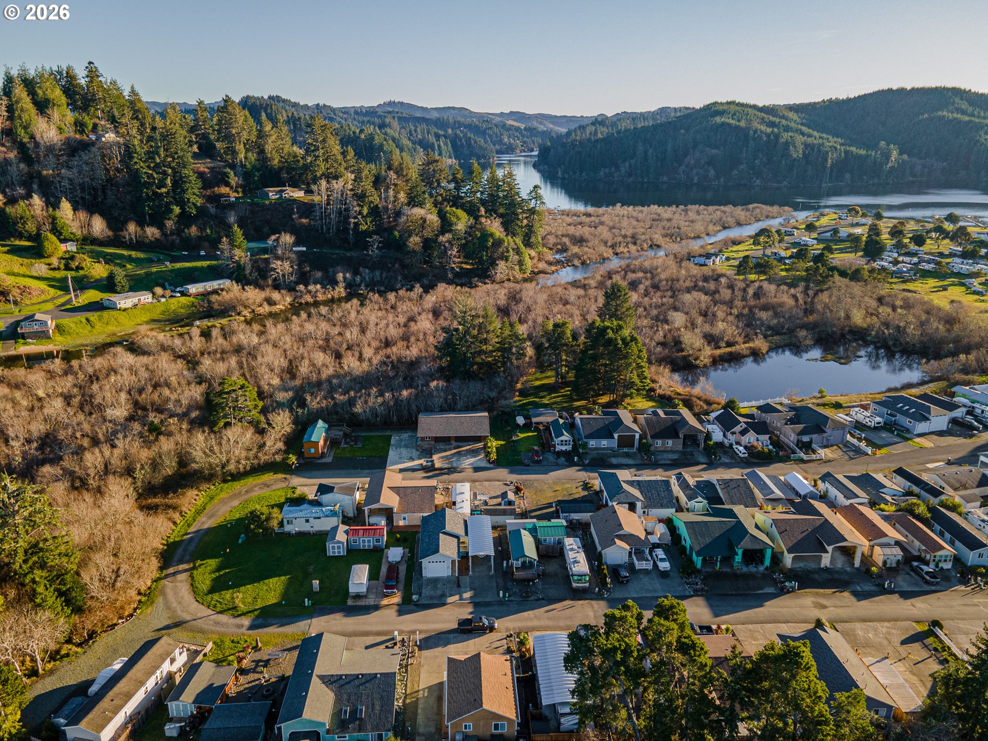 18 Pine Lane Lakeside, OR 97449 - Photo 2 of 33 an aerial view of multiple house