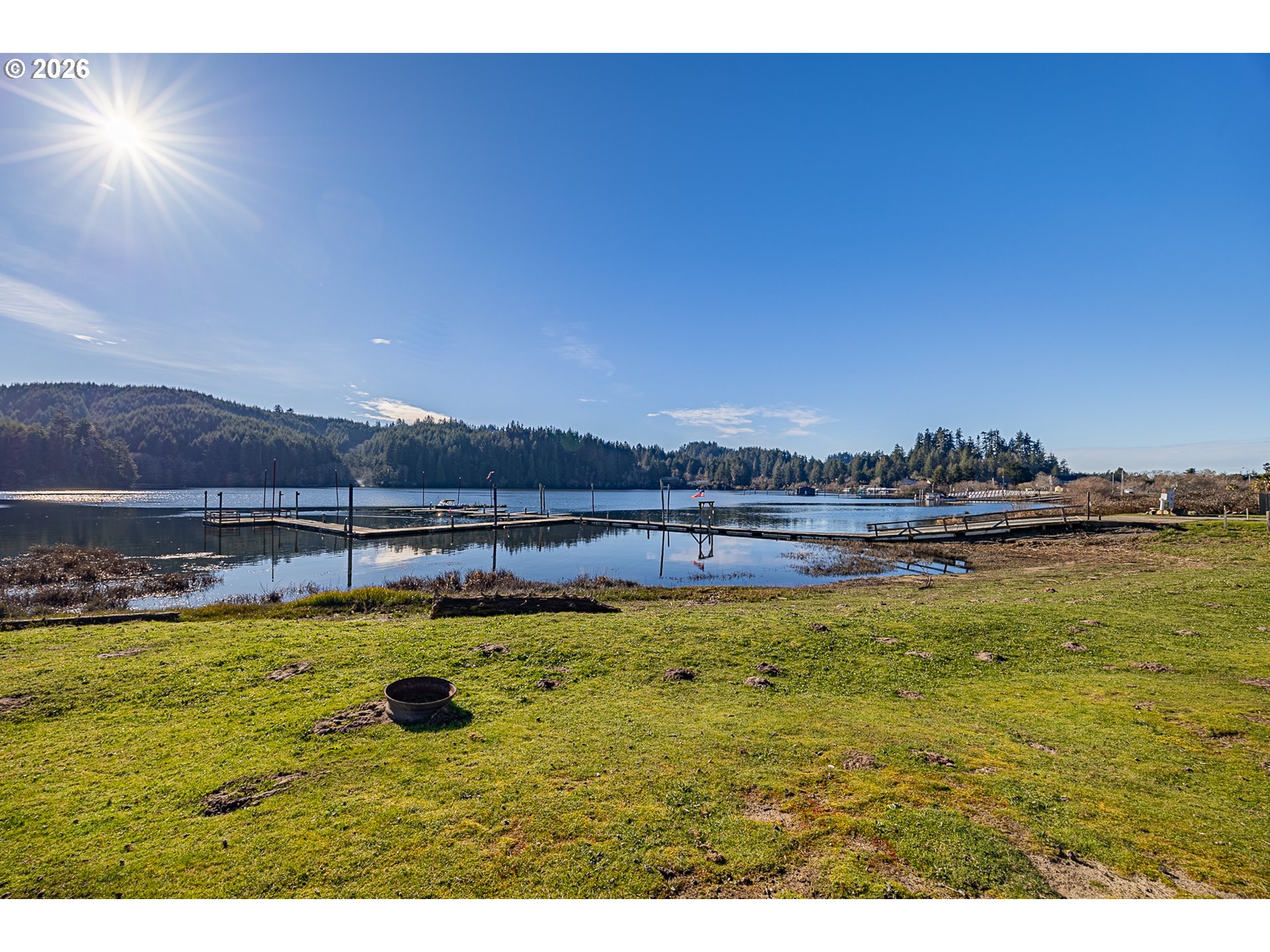 18 Pine Lane Lakeside, OR 97449 - Photo 28 of 33 a view of a swimming pool with an ocean view