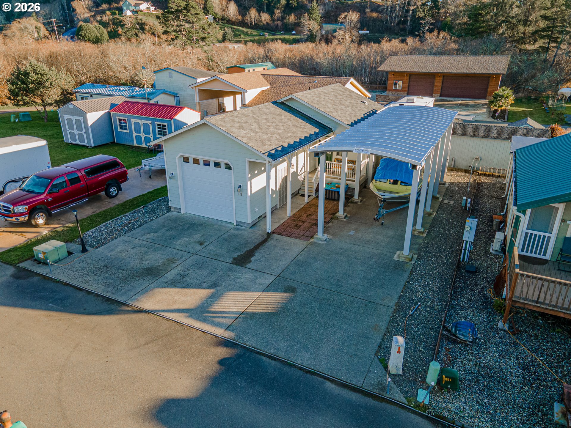 18 Pine Lane Lakeside, OR 97449 - Photo 31 of 33 an aerial view of a houses with yard