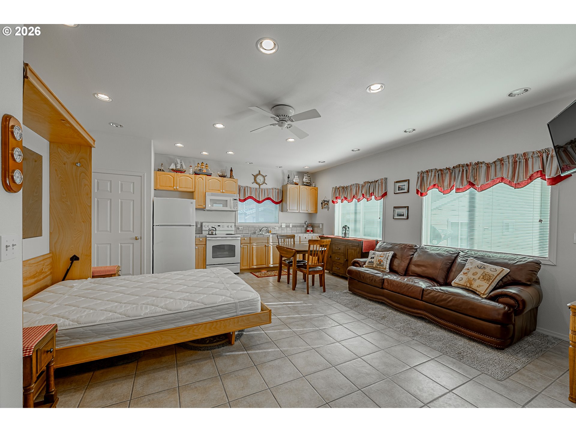 18 Pine Lane Lakeside, OR 97449 - Photo 6 of 33 a living room with furniture and kitchen view