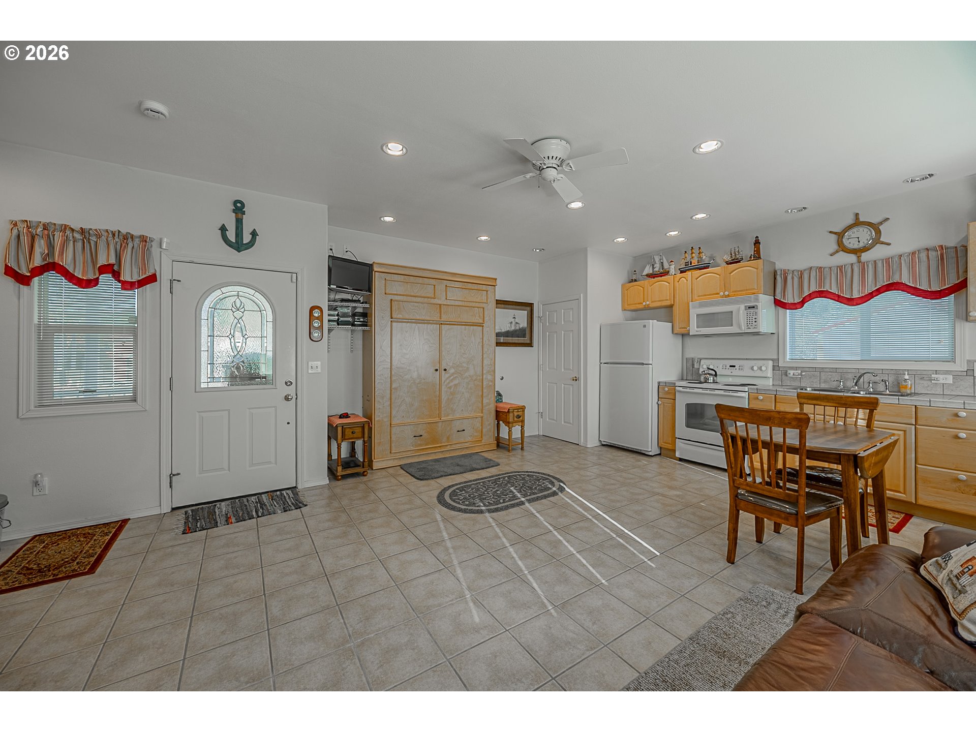 18 Pine Lane Lakeside, OR 97449 - Photo 8 of 33 a view of a livingroom with furniture wooden floor and a rug