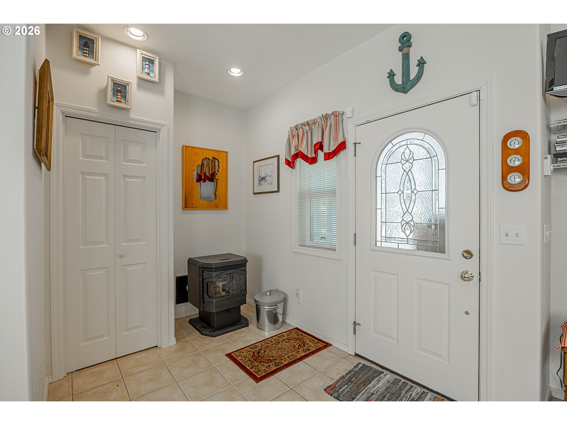 18 Pine Lane Lakeside, OR 97449 - Photo 9 of 33 a view of an entryway with wooden floor