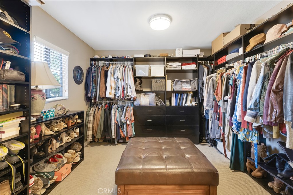3843 San Gabriel Street Simi Valley, CA 93063 - Photo 36 of 52 a view of walk in closet with clothes and shoes