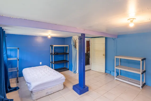 a en suite bathroom with a toilet sink and mirror