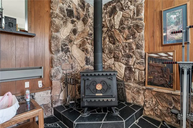 a kitchen with stainless steel appliances granite countertop a stove sink and cabinets