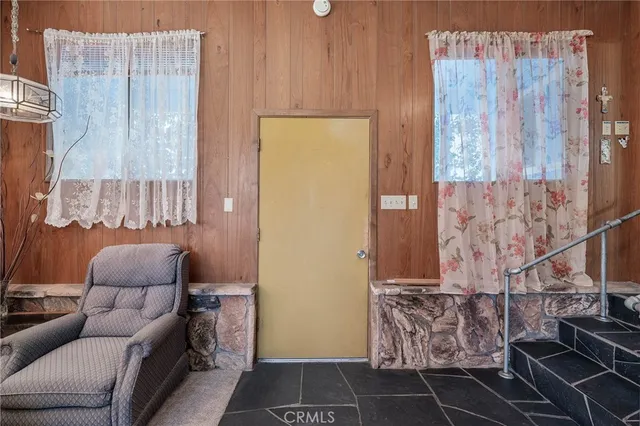 a kitchen with stainless steel appliances granite countertop a stove and cabinets