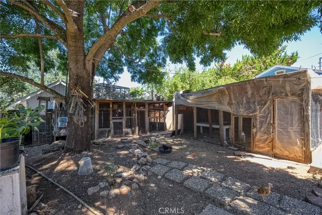 a view of a back yard from a balcony