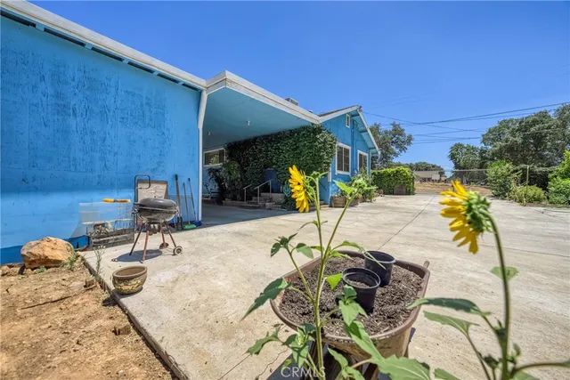 a front view of a house with a yard and a garage