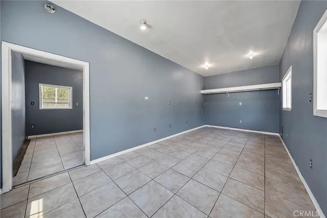 a view of an empty walk in closet