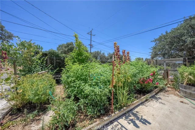a view of a chairs and table in the patio