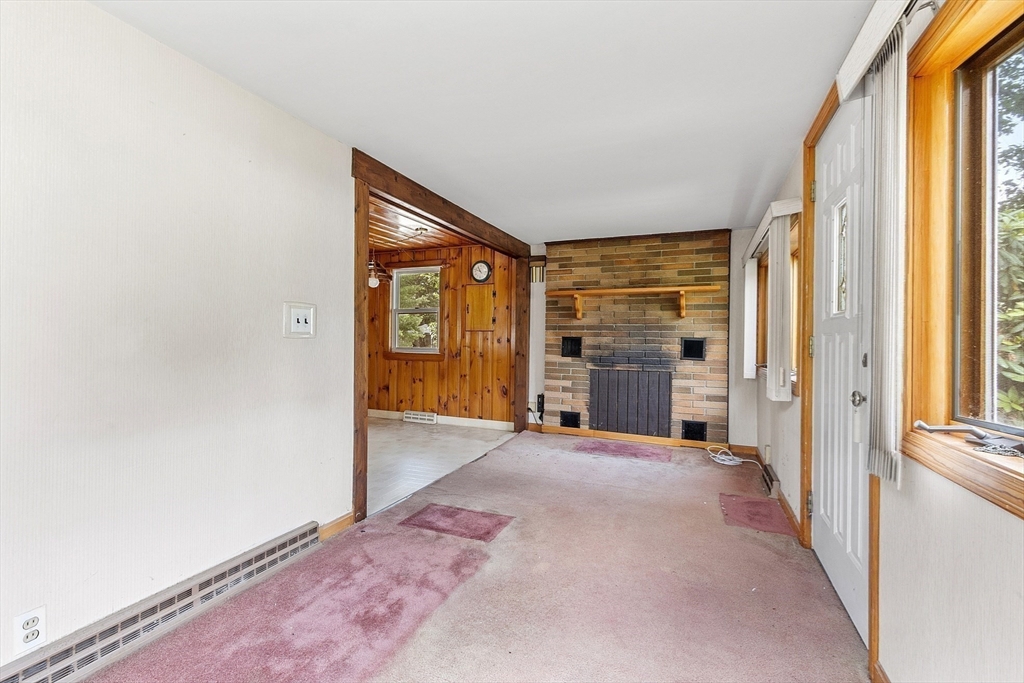 31 Birch Road Westford, MA 01886 - Photo 11 of 42 a view of a big room with an entryway