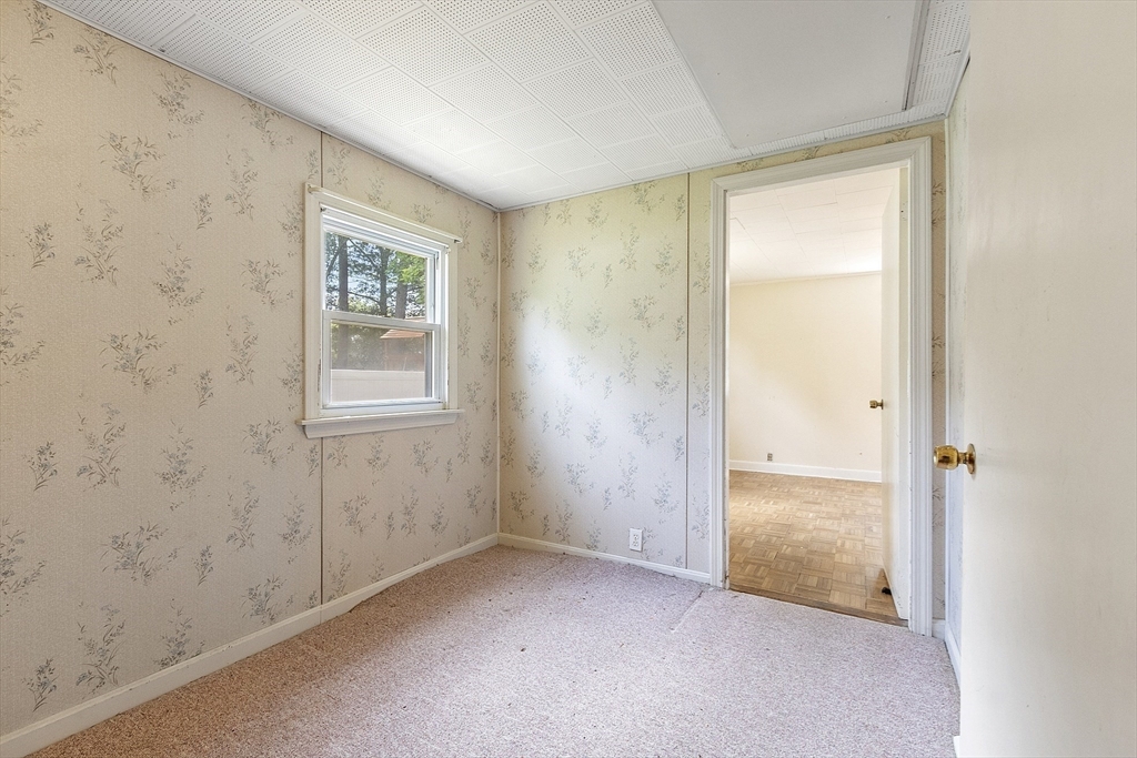 31 Birch Road Westford, MA 01886 - Photo 21 of 42 an empty room with windows and closet