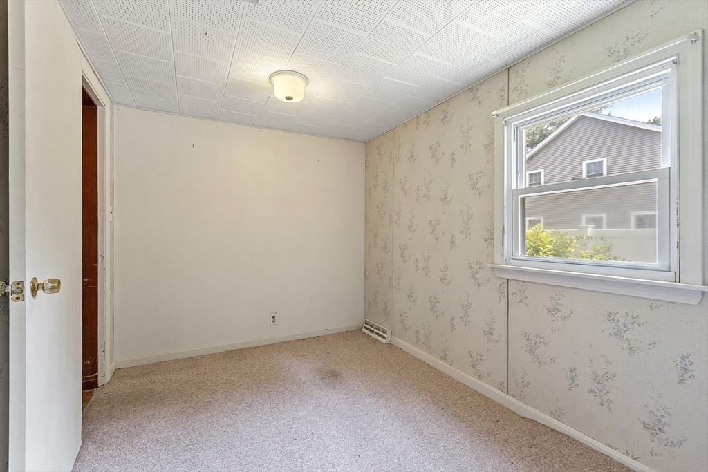 31 Birch Road Westford, MA 01886 - Photo 22 of 42 an empty room with windows and closet
