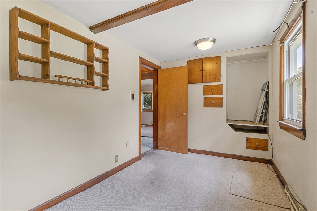 31 Birch Road Westford, MA 01886 - Photo 25 of 42 a view of an entryway with wooden floor and door