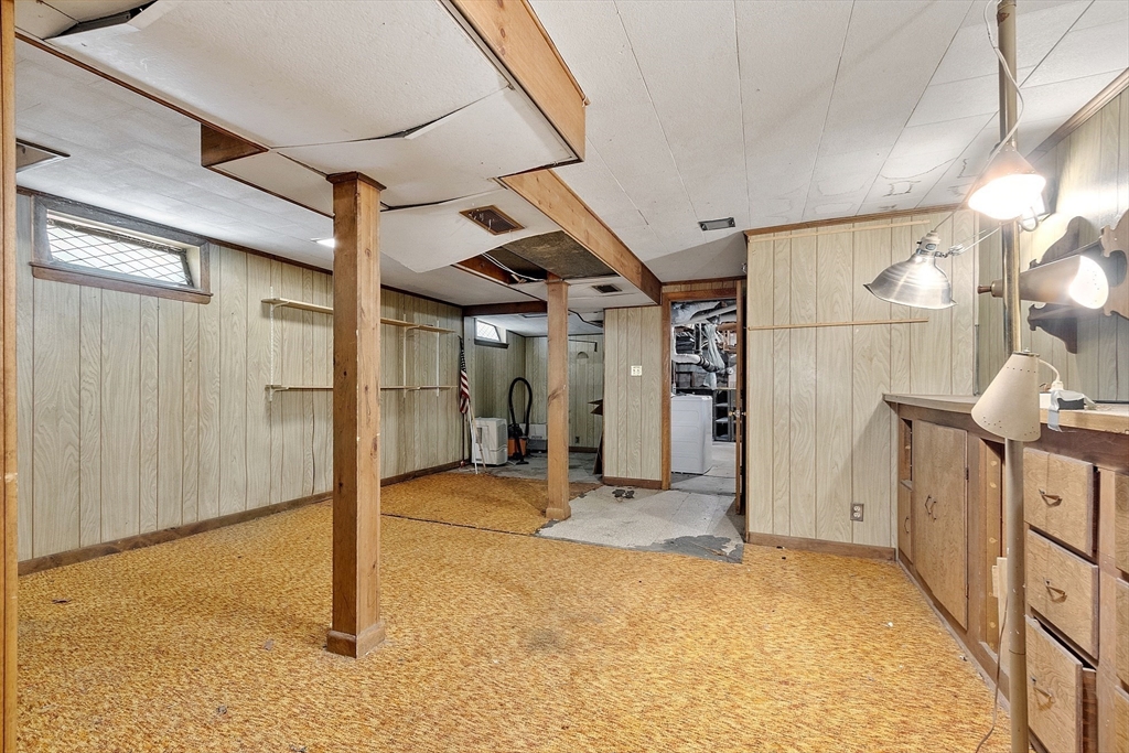 31 Birch Road Westford, MA 01886 - Photo 27 of 42 a view of a hallway with a chandelier