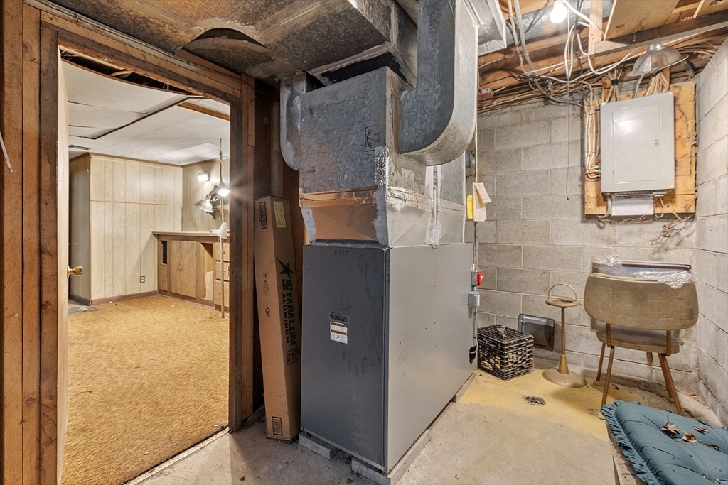 31 Birch Road Westford, MA 01886 - Photo 28 of 42 a view of a bathroom with a sink and mirror