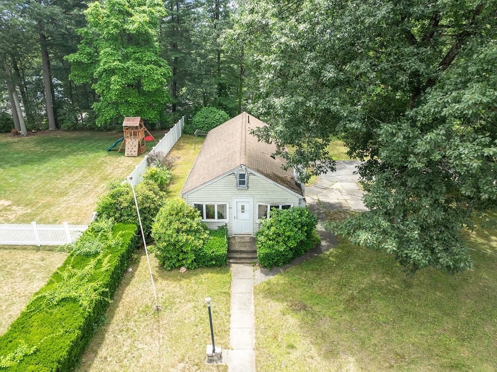 31 Birch Road Westford, MA 01886 - Photo 29 of 42 a view of a garden with large trees